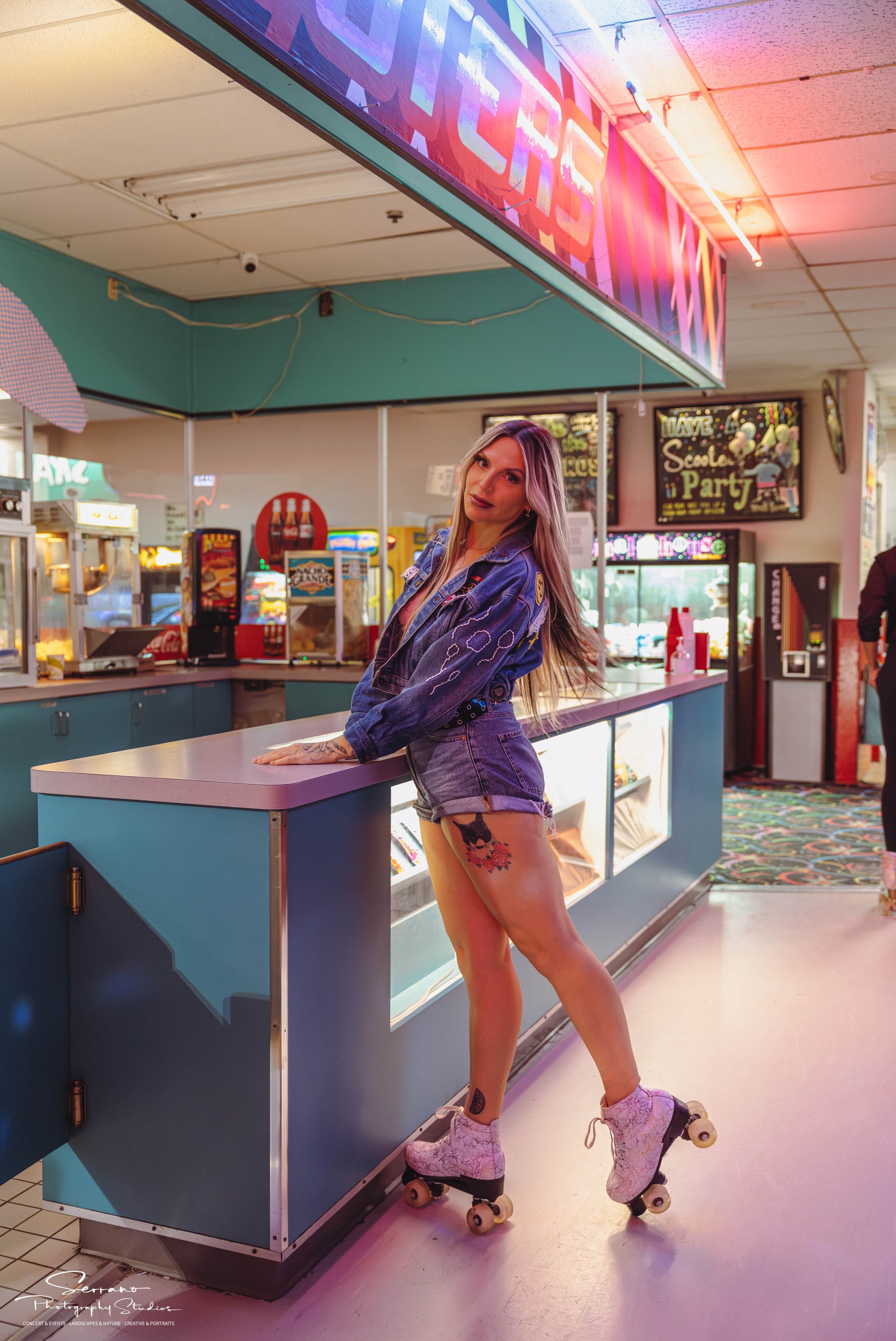 Retro roller-rink editorial with soft glam, posed on skates at the snack bar
